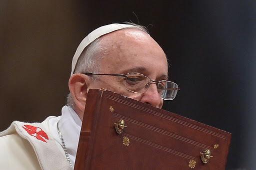 Pope Francis kisses the book of the gospels &#8211; pt