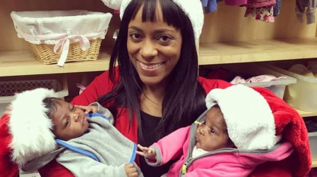 web-mother-twins-santa-hats-crisis-pregnancy-center-supplied-photo