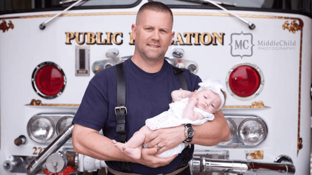 firefighter-adopts-a-baby