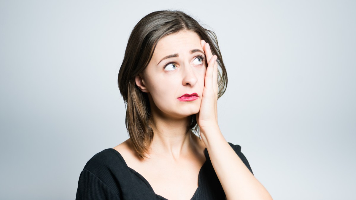 Preview Save to a lightbox Find Similar Images Share Stock Photo: Young business woman made a mistake, studio photo isolated on a gray background