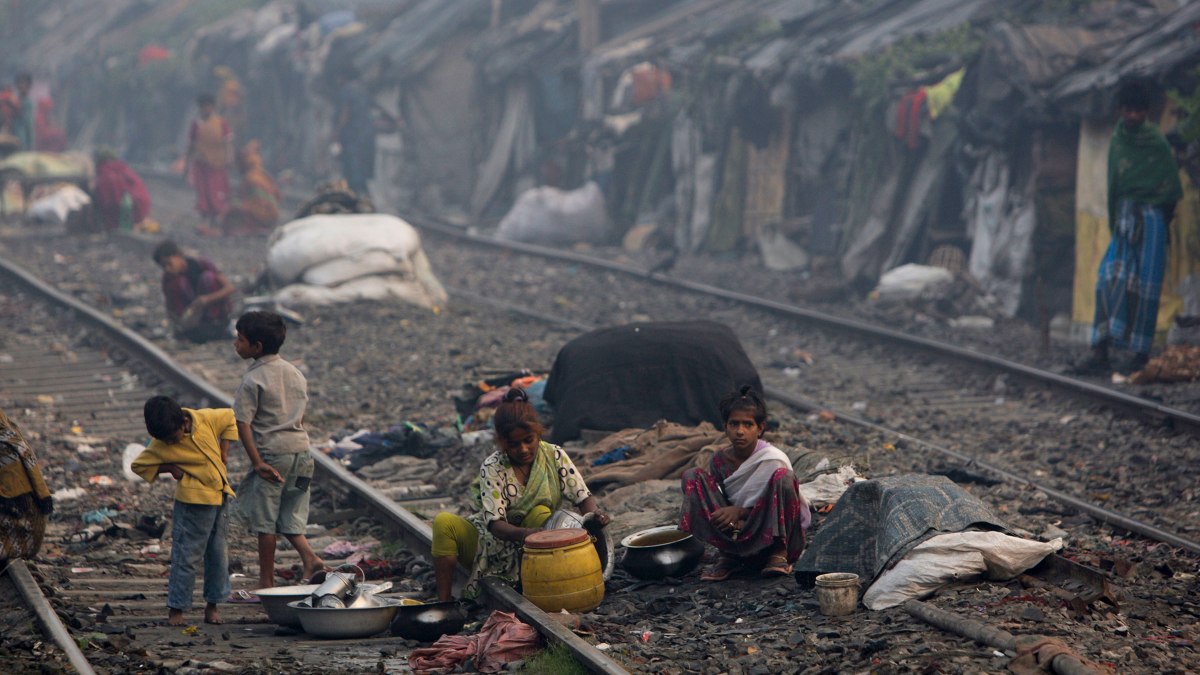 Slum Dwellers Live Near Railroad In India