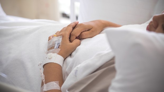 WEB-WOMAN-HOSPITAL-HAND-IV-Mocha-VP-Shutterstock_292645871