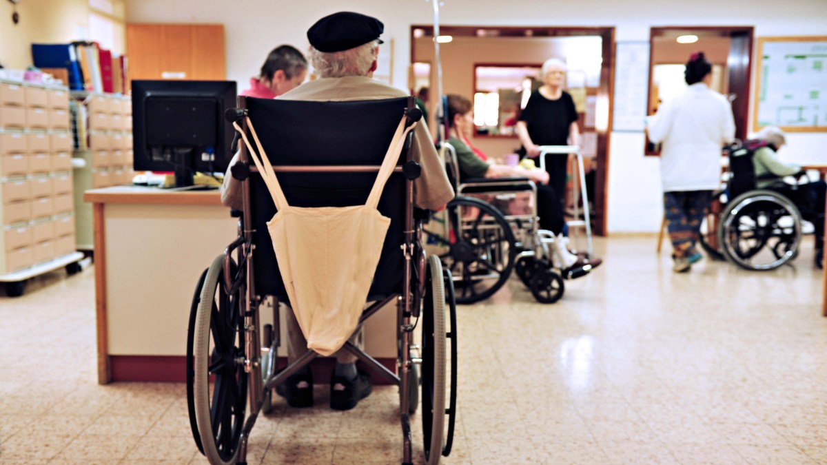 WEB ELDERLY MAN IN NURSING HOME WHEELCHAIR Shutterstock