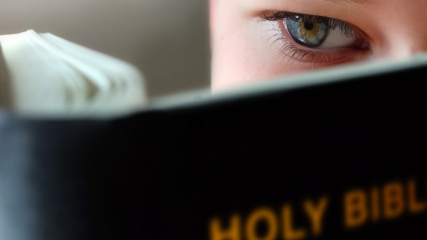 WEB3-CHILD-BOY-READING-BIBLE-EYE-shutterstock_1219452-Shutterstock