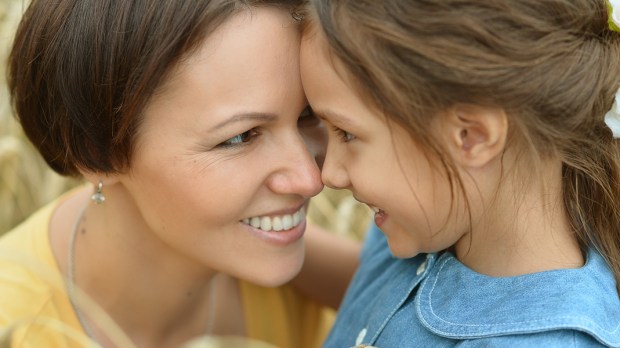 web3-mother-daughter-child-parents-smile-ruslan-guzov-shutterstock
