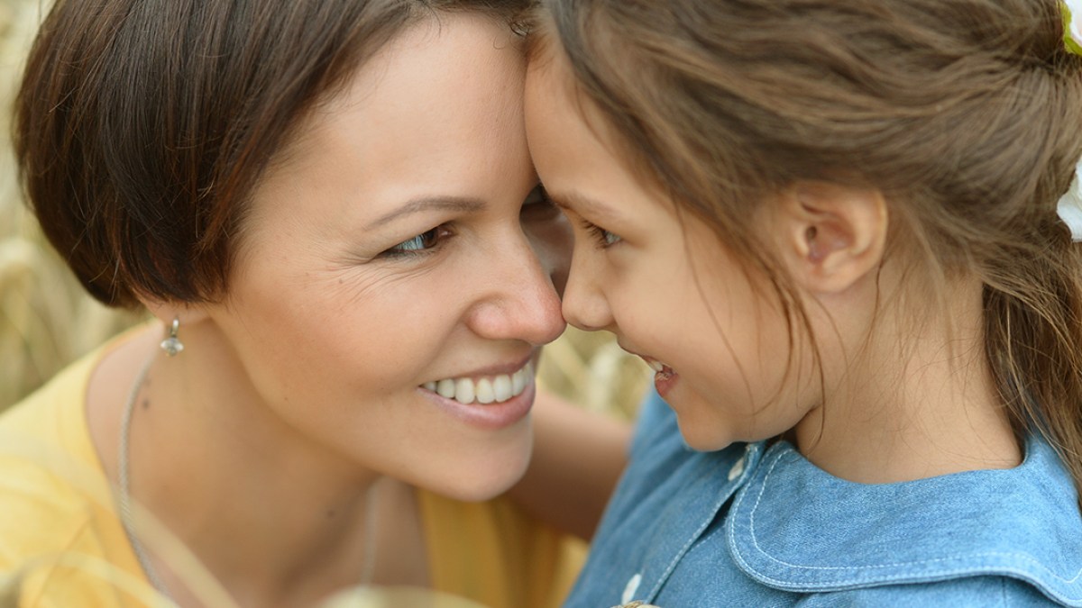 web3-mother-daughter-child-parents-smile-ruslan-guzov-shutterstock