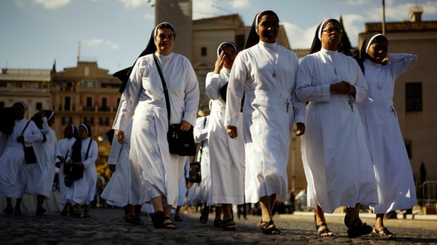 web3-photo-of-the-day-nuns-st-john-lateran-rome-corpus-christi-ap_17169569614528-andrew-medechini-ap-photo