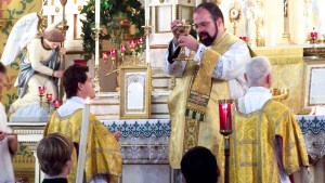 PRIEST DURING MASS