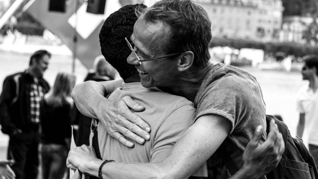 2 MEN HUGGING