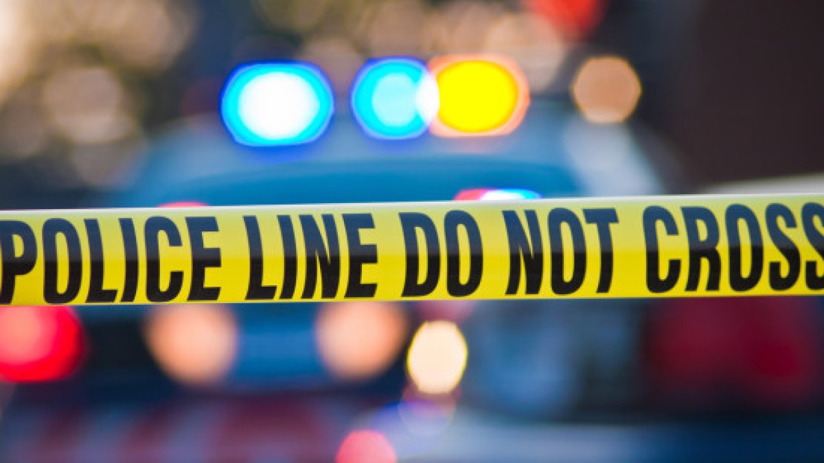 web3-shallow-depth-of-field-image-taken-of-yellow-law-enforcement-line-with-police-car-and-lights-in-the-background-shutterstock_56280433