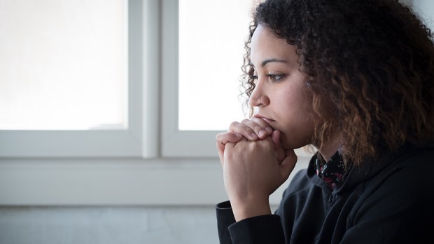 Sad and lonely young girl