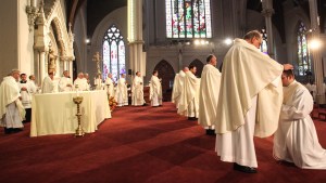 PRIEST BEING ORDAINED