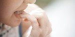 BITING NAILS