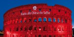 red colosseum Aiuto alla Chiesa Che Soffre