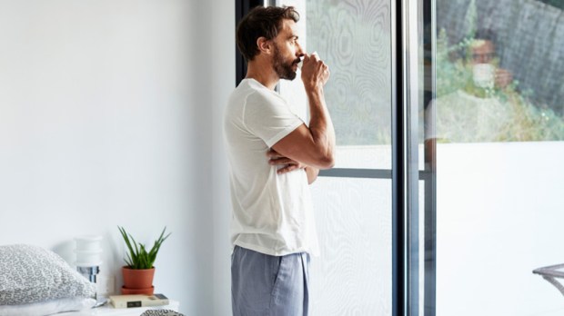 MAN DRINKING COFFEE IN THE MORNING