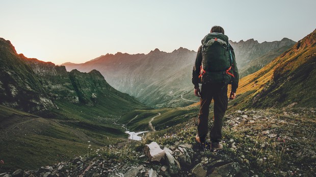 MAN HIKING