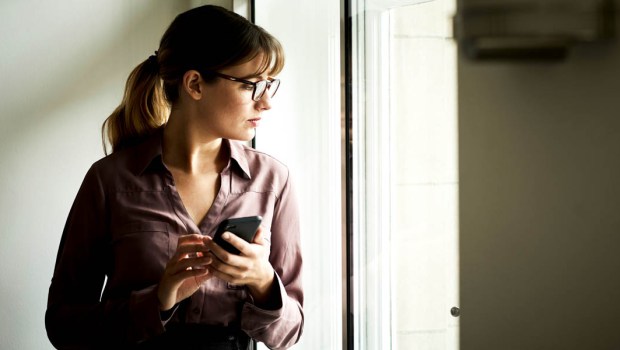 WOMAN WITH CELL PHONE