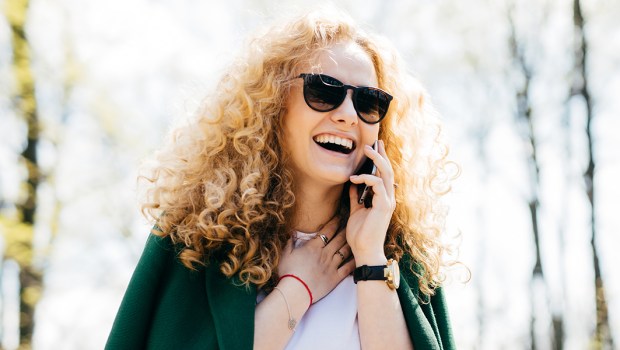 WOMAN TALKING ON PHONE