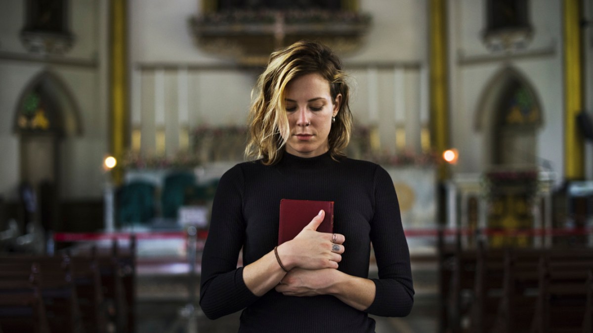 WOMAN PRAYING