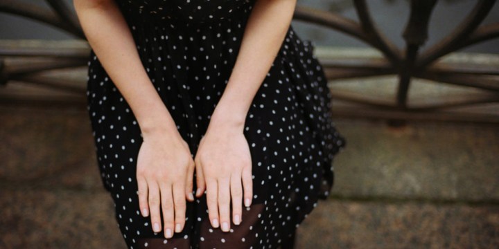 WOMAN SITTING