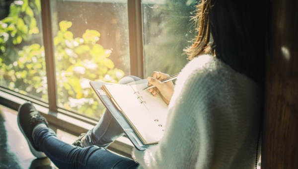 WOMAN,WRITING,JOURNAL