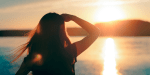 woman looking at the sunset