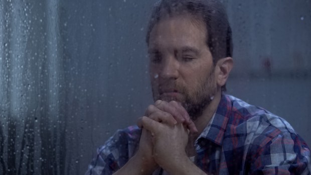 adult man praying
