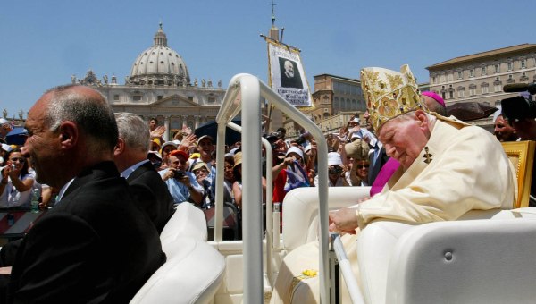 Pope John Paul II leaves St Peter's square at the end of a ceremony to make Italian priest Padre Pio a saint