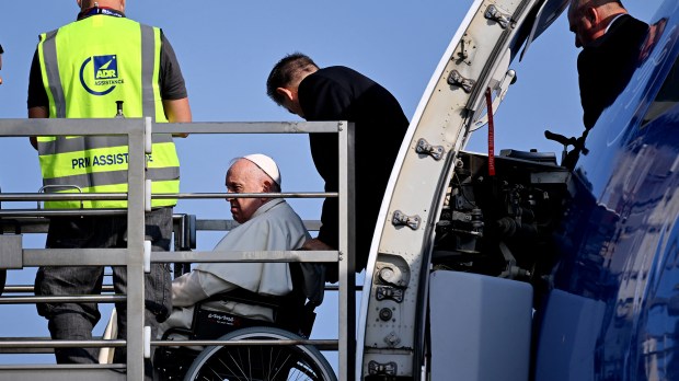 Pope-Francis-boards-his-plane-at-Romes-Fiumicino-airport-as-he-departs-for-a-trip-to-Canada-AFP-