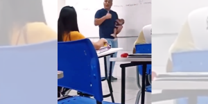 Vídeo: professor dá aula com filho de aluna no colo