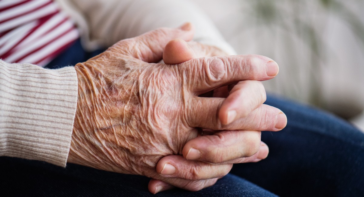 OLD-PERSON-PRAY-HAND-shutterstock_1049228039.jpg