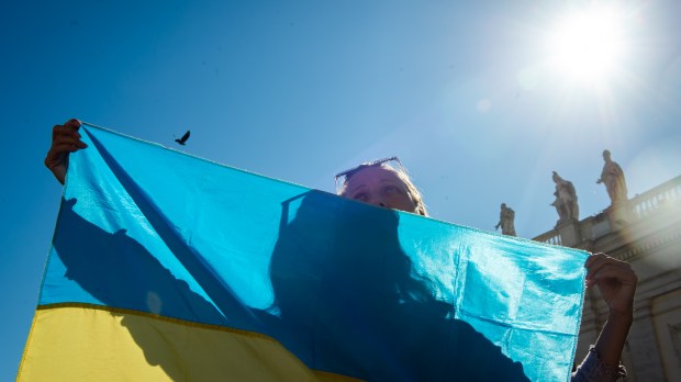 Ukrainian-woman-Holding-the-Flag-of-Ukraine-Audience-October-05-2022