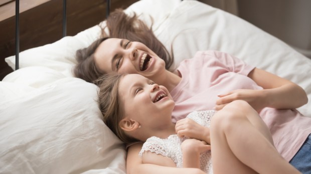 Mum and daughter laughing