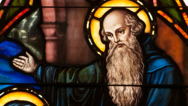 Detail of stained glass window depicting face of St. Benedict of Nursia