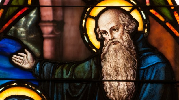 Detail of stained glass window depicting face of St. Benedict of Nursia