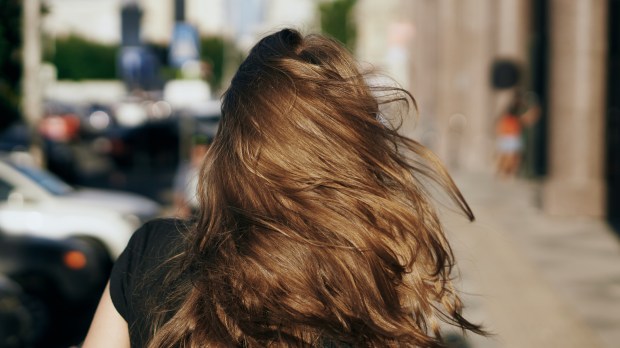 BACK-WOMAN-STREET-shutterstock_688000768.jpg