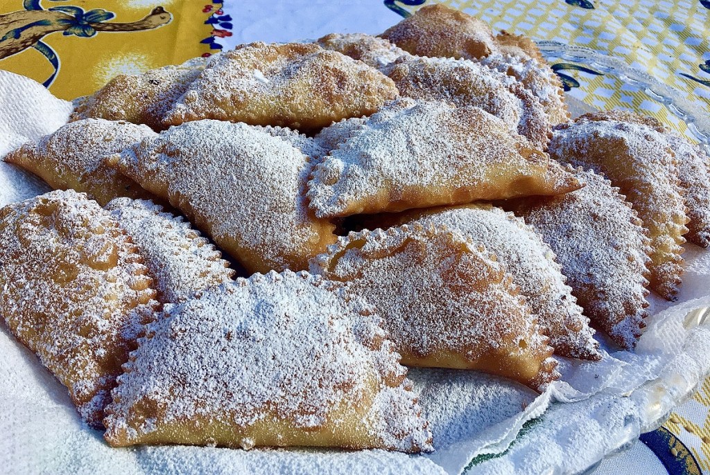 Cassatelle, semi-circular dough pockets filled with ricotta