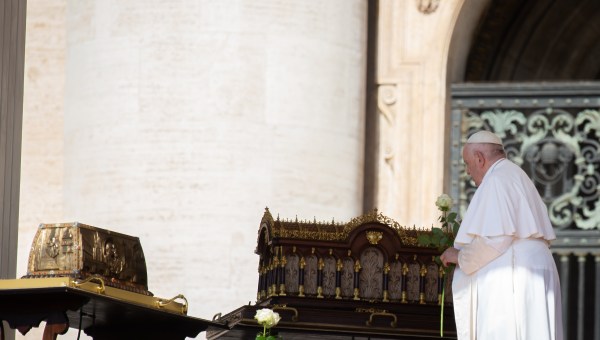 Pope Francis stands by the relics of Saint Therese of Lisieux