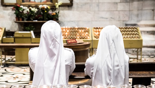 Nuns praying in church