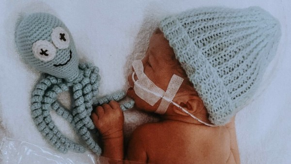 Preemie baby with knit octopus