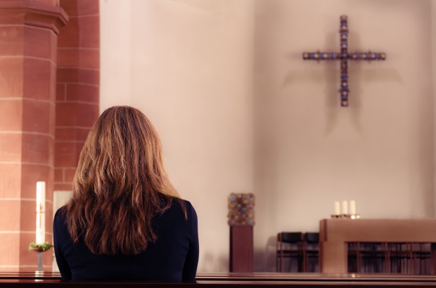 woman-church-shutterstock