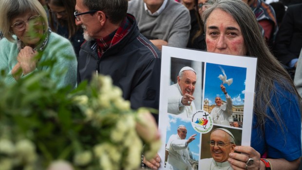 Devotees attend a Rosary in homage to Pope Francis following his death in Saint Peter's Square, the Vatican, on April 21, 2025