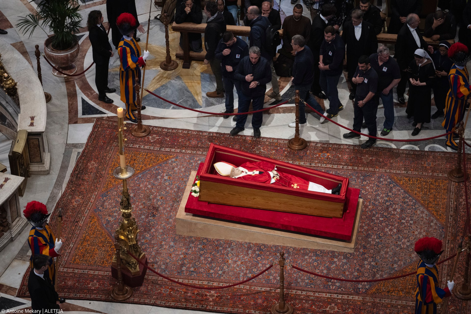 People pay their respects to late Pope Francis as he lies in state at St Peter's Basilica in The Vatican, on April 24, 2025.