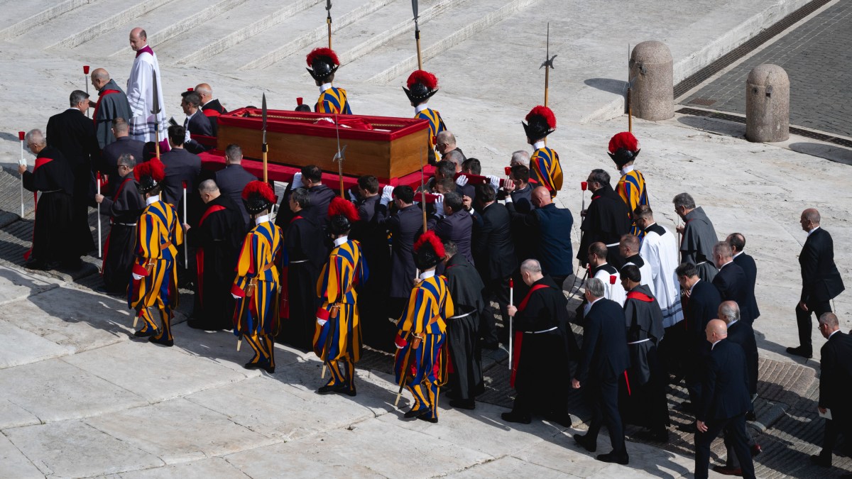 Pallbearers carry the coffin of the late Pope from the chapel of Santa Marta to St. Peter's Basilica in the Vatican on April 23, 2025.