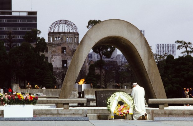 Hiroshima, Japan - February 1981 Pope John Paul II praying in front of the Memorial of Hiroshima.