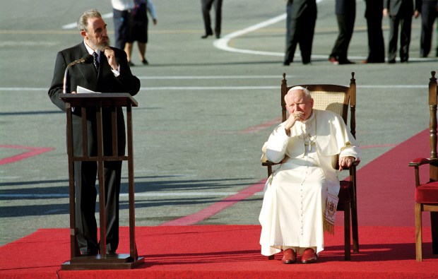 Havana, Cuba - January 1998 The most famous photograph of the journey at the end of the century.Fidel Castro, who set his olive green uniform aside for the occasion, at the Pope's side.