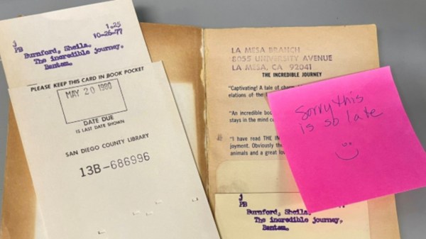 Library book and sticky note apology