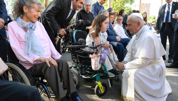 Pope Leo XIV speaking with a group of disabled people and caregivers in Madrid